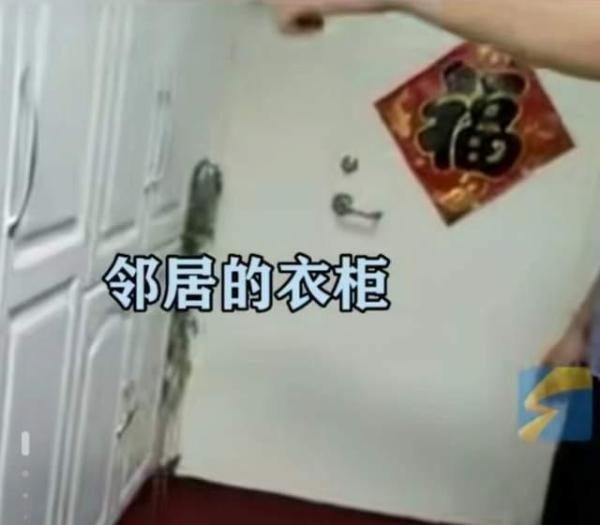 入户门被邻居封死后续,邻居与开发商疑是亲属,女子维权4年未果